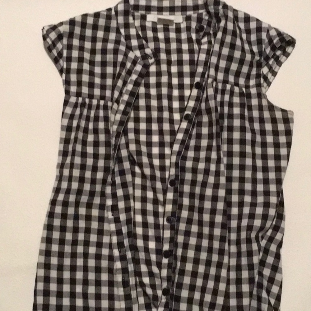Charlotte Russe black and white checkered vest.
